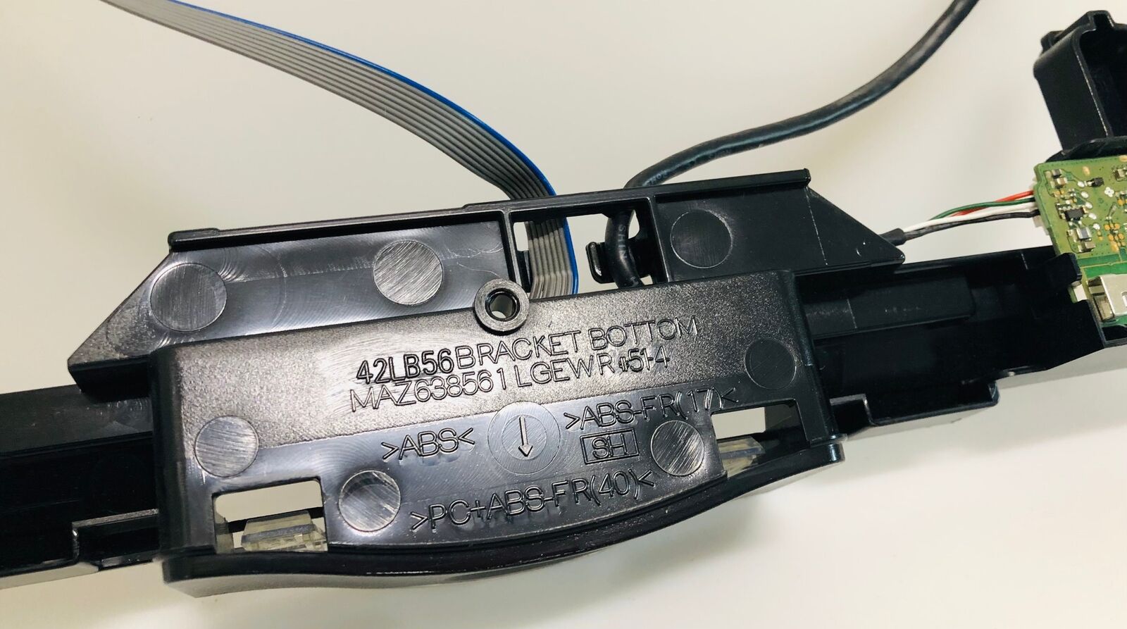MAZ638561 BRACKET WITH POWER BUTTON & IR SENSOR - LG 55LF592V