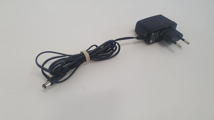 AC/DC Adapter – Model T090060‑2C1 9 V ⎓ 0.6 A (5.4 W) 