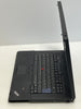 Black ThinkPad laptop on a white background