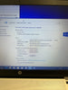 Computer screen displaying a Windows operating system with an HP logo on the side.