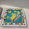 Ecost Customer Return Hasbro Monopoly Journey Around the World, Board Game for Families and Children